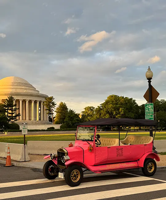 Night view of Washington DC monuments during luxury guided city tour
